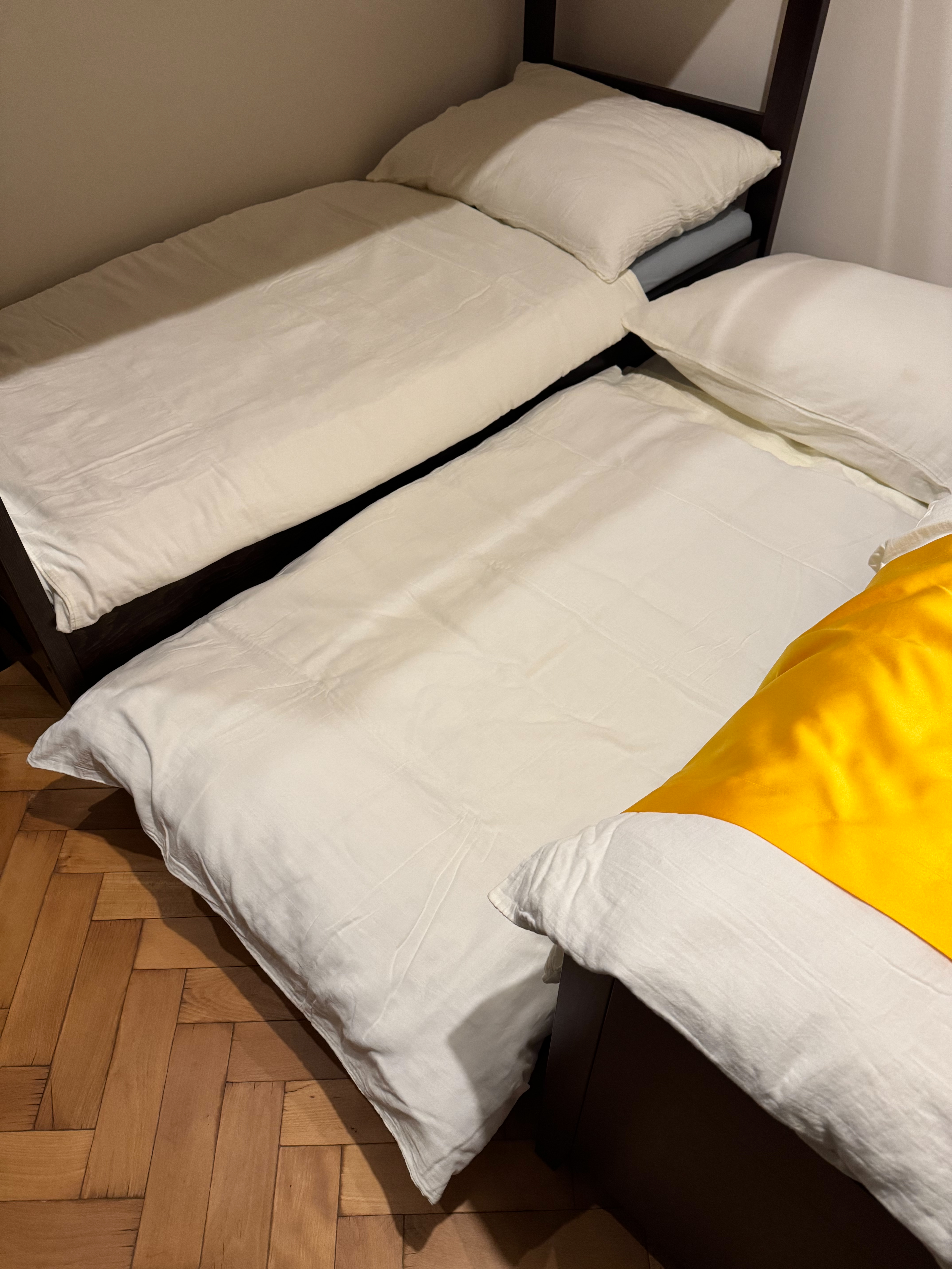 The comfortable extra bed setup for additional guests