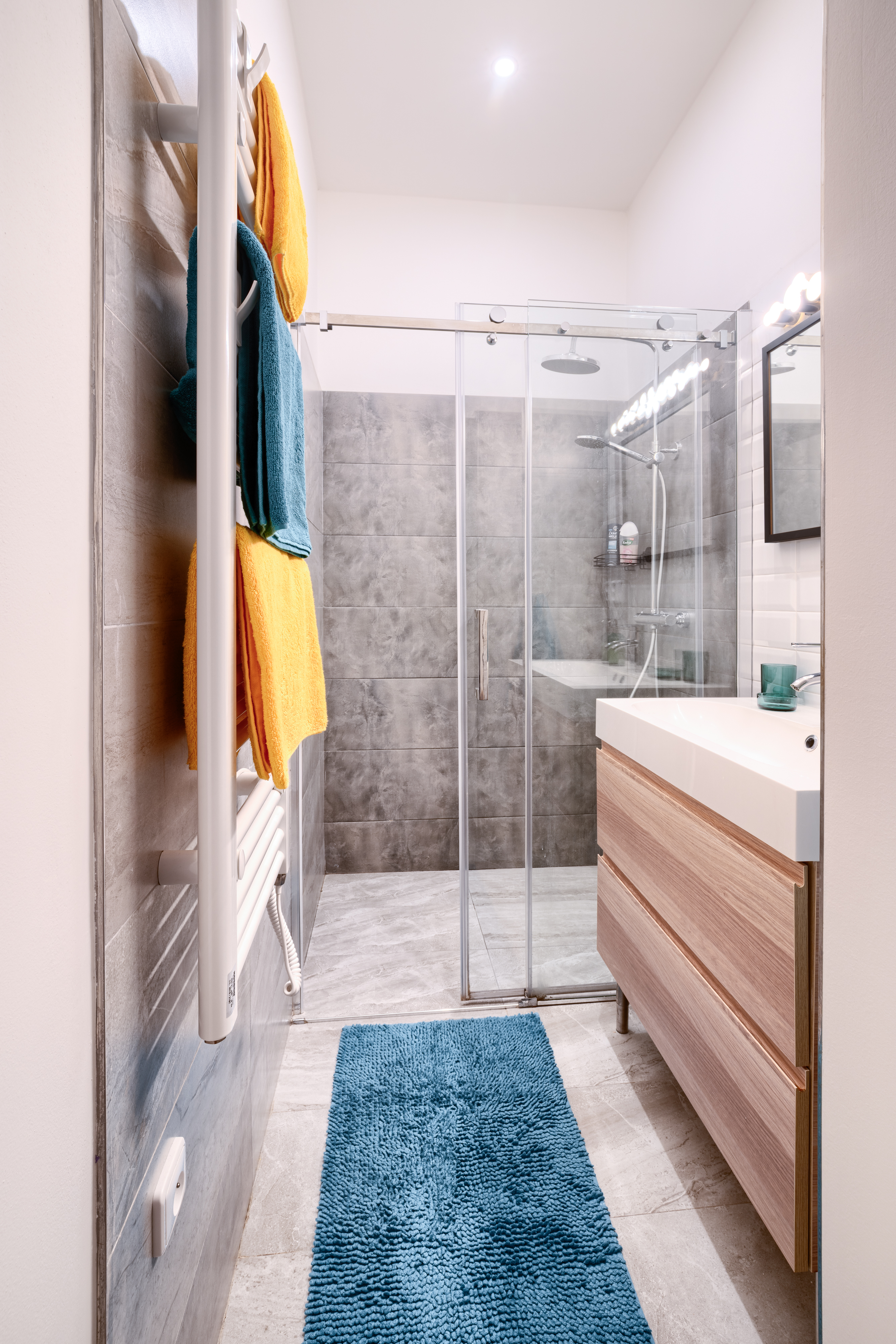 The bathroom's modern fixtures and natural lighting
