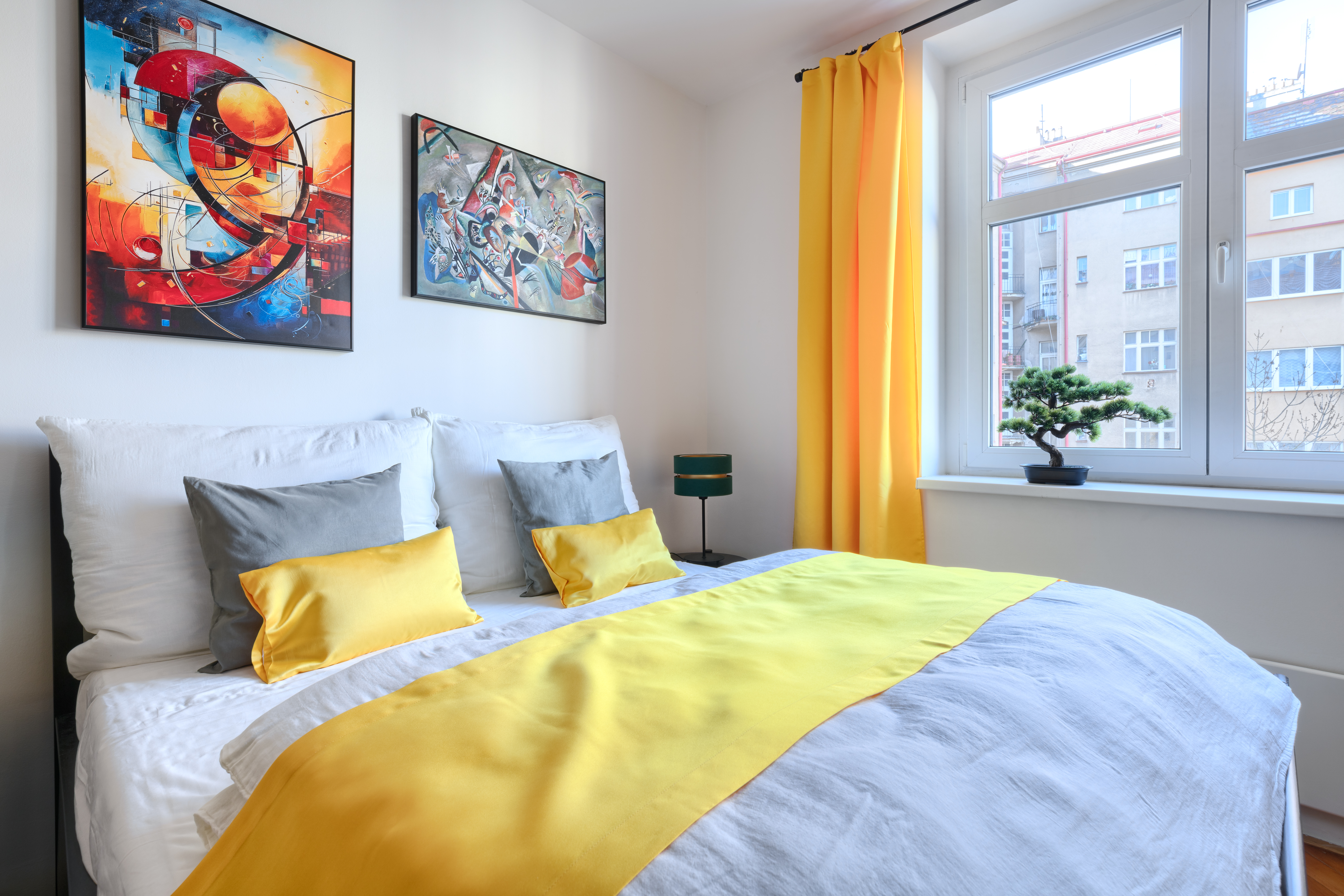 The main bedroom with its comfortable queen-size bed and stylish decor