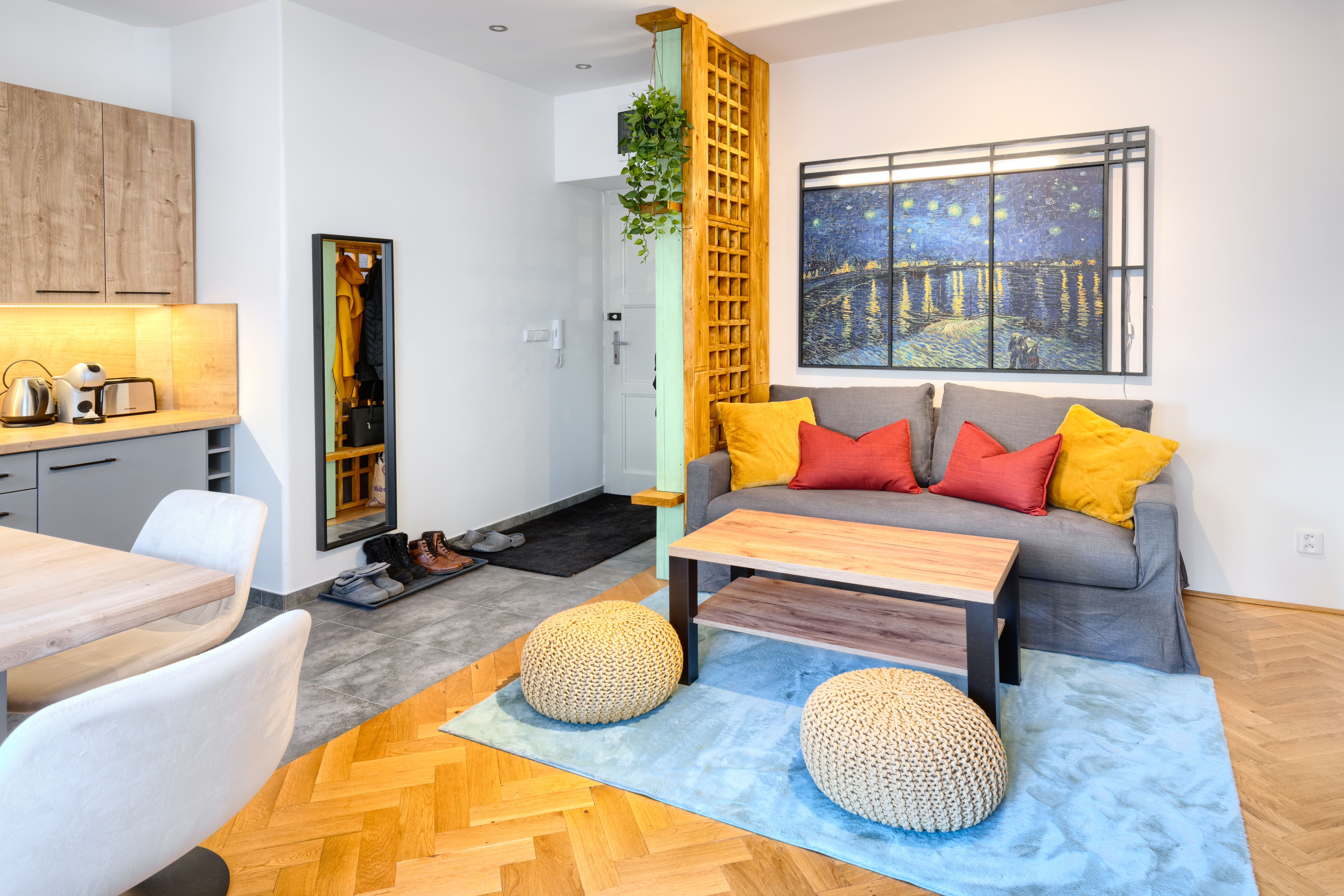 The cozy seating area with its stylish decor and comfortable atmosphere