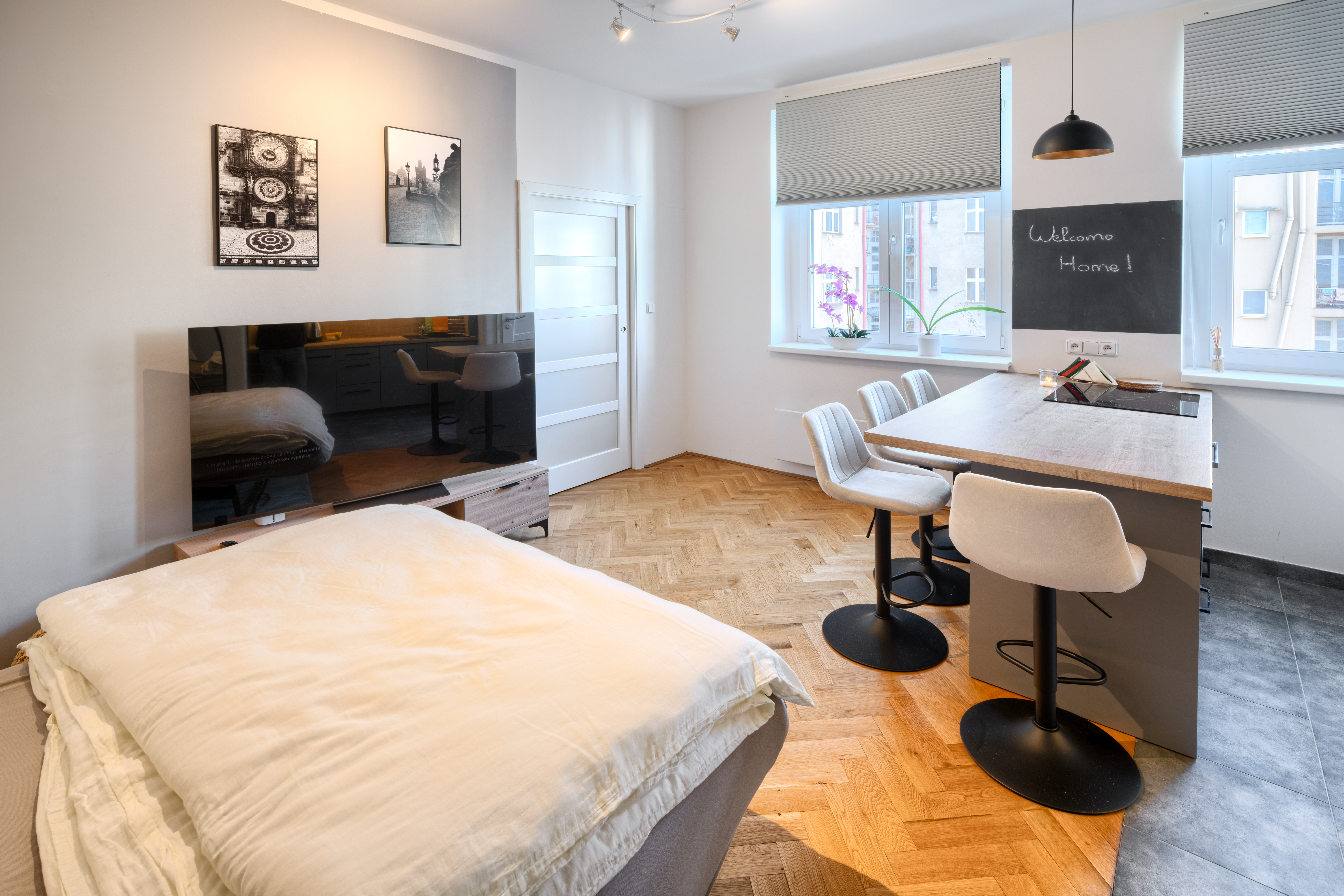 The modern lighting fixtures that add warmth to the space